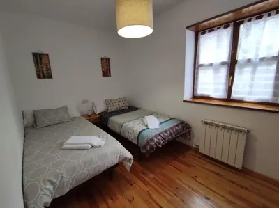Cama o camas de una habitación en Inmocyma La terraceta de Linsoles-Valle de Benasque
