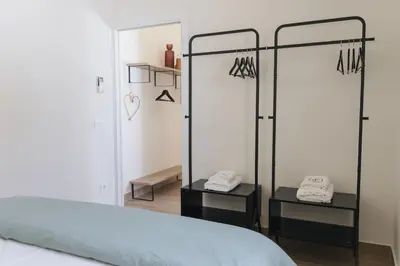 Cama o camas de una habitación en Apartaments la rambla - Garnatxa - 4 persones