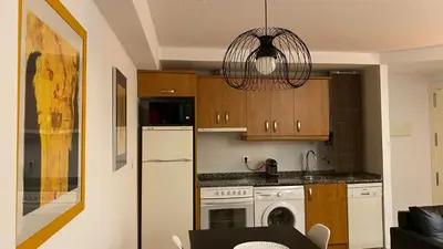 Una cocina o zona de cocina en LC Apartamentos César Augusto