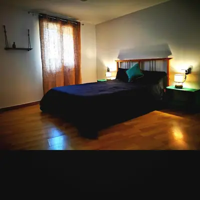 Cama o camas de una habitación en Cornu Karma Apartment Siuranella