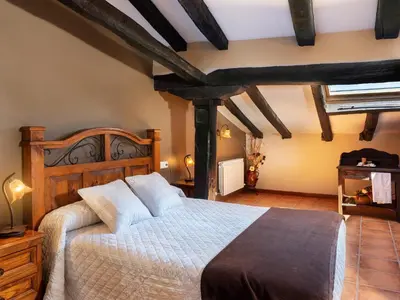 Cama o camas de una habitación en Casa rural ALBIRENA