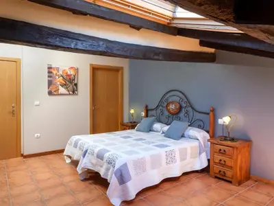 Cama o camas de una habitación en Casa rural ALBIRENA
