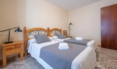 Cama o camas de una habitación en Cal Giral I