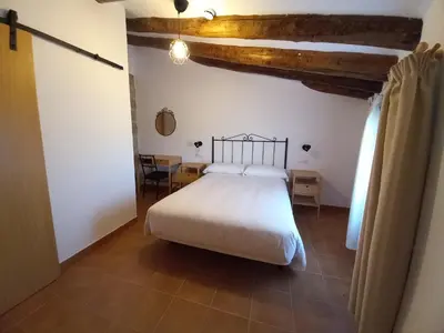 Cama o camas de una habitación en Rincón de Guara