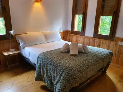 Cama o camas de una habitación en GAUSAC I