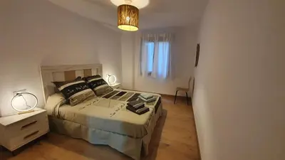 Cama o camas de una habitación en Xia Apartaments con acceso a piscina