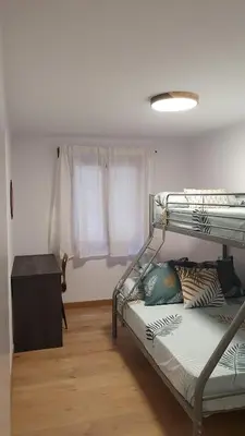 Cama o camas de una habitación en Xia Apartaments con acceso a piscina