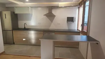 Una cocina o zona de cocina en Xia Apartaments con acceso a piscina