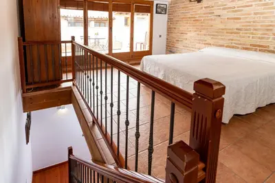 Cama o camas de una habitación en Apartamento Duplex Puente de Piedra, en un enclave único y exclusivo