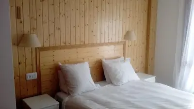Cama o camas de una habitación en Agradable apartamento con jardín privado en Cerler