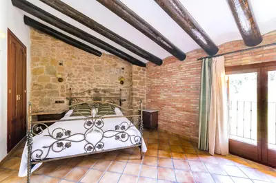 Cama o camas de una habitación en HOTEL EL CASTELL