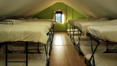 Cama o camas de una habitación en Albergue rural l'Almada de Yebra