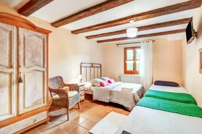 Cama o camas de una habitación en Warm apartment in Ardanué with mountain view, 45 m²