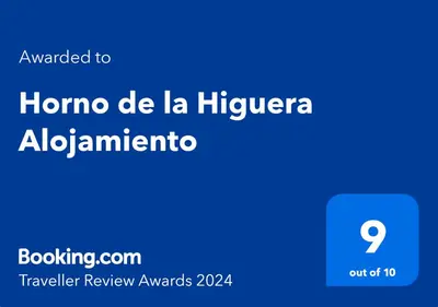 Certificado, premio, señal o documento que está expuesto en Horno de la Higuera Alojamiento