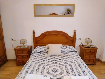 Cama o camas de una habitación en Peña Telera