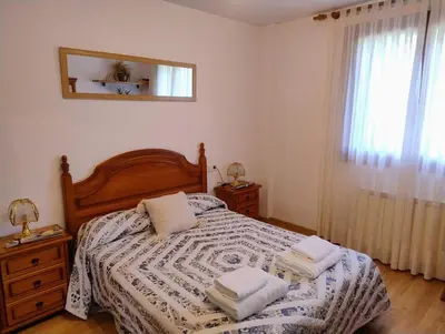 Cama o camas de una habitación en Peña Telera