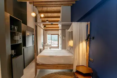 Cama o camas de una habitación en MOCHO-RURAL-HOME MATARRAÑA SUITE