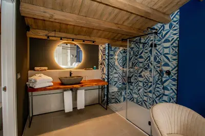 Cama o camas de una habitación en MOCHO-RURAL-HOME ULLDEMO SUITE
