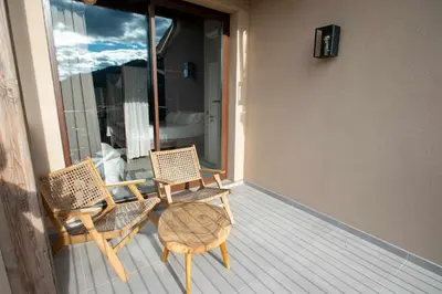 Un balcón o terraza de MOCHO-RURAL-HOME ULLDEMO SUITE