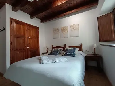 Cama o camas de una habitación en Inmocyma Residencial Linsoles-Valle de Benasque