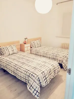 Cama o camas de una habitación en Apartamento Bornos&Huesca