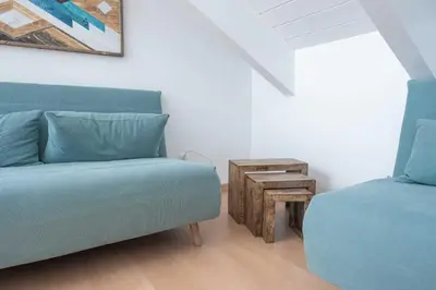Zona de estar de LOIRA CASA SANCHINES: Cálido dúplex en Benasque