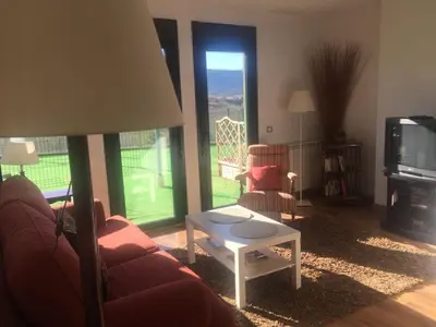 Una televisión o centro de entretenimiento en Apartamento Balcón de Jaca
