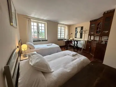 Cama o camas de una habitación en Biescas Apartamento Casa Josito La Cadiera