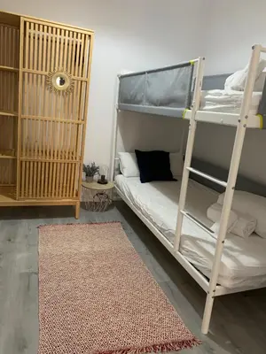 Cama o camas de una habitación en VTZ El Balcón a la Basílica V - vistas inmejorables a la Basílica del Pilar!