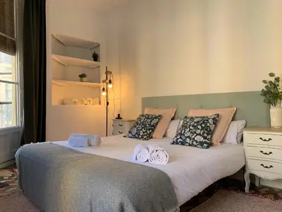 Cama o camas de una habitación en VTZ El Balcón a la Basílica V - vistas inmejorables a la Basílica del Pilar!