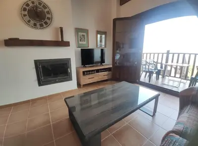 Una televisión o centro de entretenimiento en Apartamento Fuendeplata