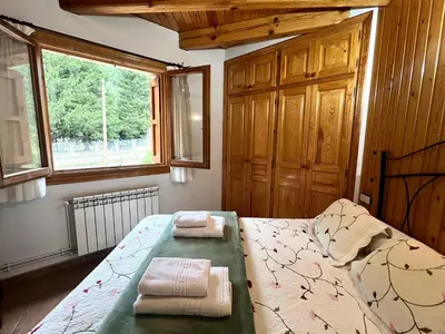 Cama o camas de una habitación en Apartament Àtic d'Espot - L'Amfitriona