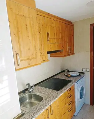 Una cocina o zona de cocina en Origen Pelaire Refugio Tena Centro Biescas con encanto UbicacionTop