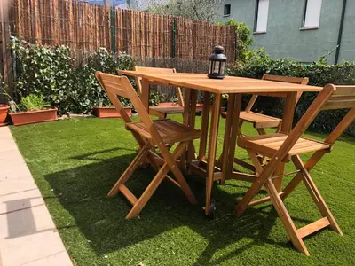 Jardín al aire libre en Casa adosada familiar con jardín y piscina