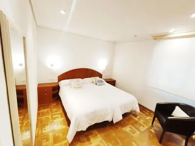 Cama o camas de una habitación en Apartamento turístico San Juan