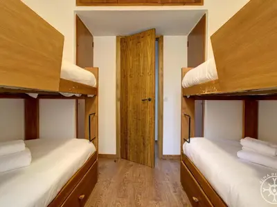 Cama o camas de una habitación en VUELTA A CASA de Alma de Nieve