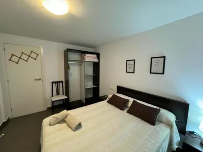 Cama o camas de una habitación en APARTAMENTO ROMELIA bajo A