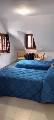 Cama o camas de una habitación en HOTEL FAMILIAR MAXIMINA