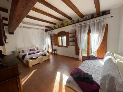 Cama o camas de una habitación en Masia Catalana SolSenyor by El Secret de la Conca