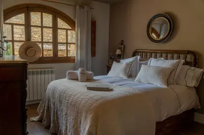Cama o camas de una habitación en Apartamentos El Rincón de Usana Zona Zero