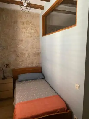 Cama o camas de una habitación en Casa Rural en el Matarraña.