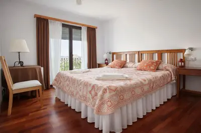 Cama o camas de una habitación en Habitaciones con encanto - Cal Alejandro