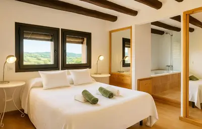 Cama o camas de una habitación en Habitaciones con encanto - Cal Alejandro