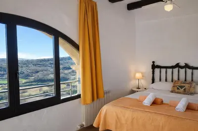 Cama o camas de una habitación en Habitaciones con encanto - Cal Alejandro