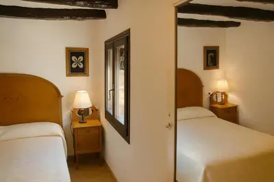 Cama o camas de una habitación en Habitaciones con encanto - Cal Alejandro