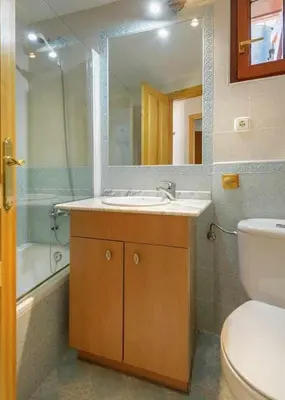 Un baño de edificio CAPERAN 1