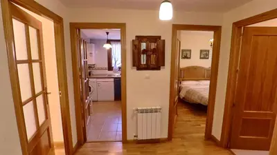 Cama o camas de una habitación en Los Avellanos de Escarrilla - tucasaenlospirineos