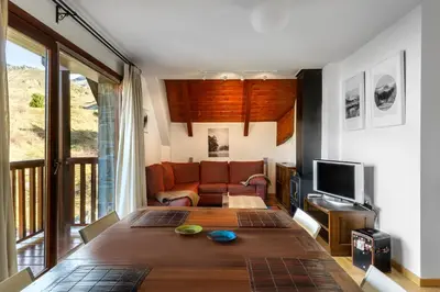 Una televisión o centro de entretenimiento en Apartamento Saliecho 3