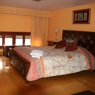Cama o camas de una habitación en HOSTAL BURGALES