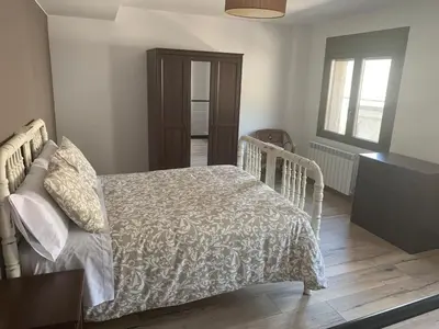 Cama o camas de una habitación en Dúplex Rural Casa Bergua